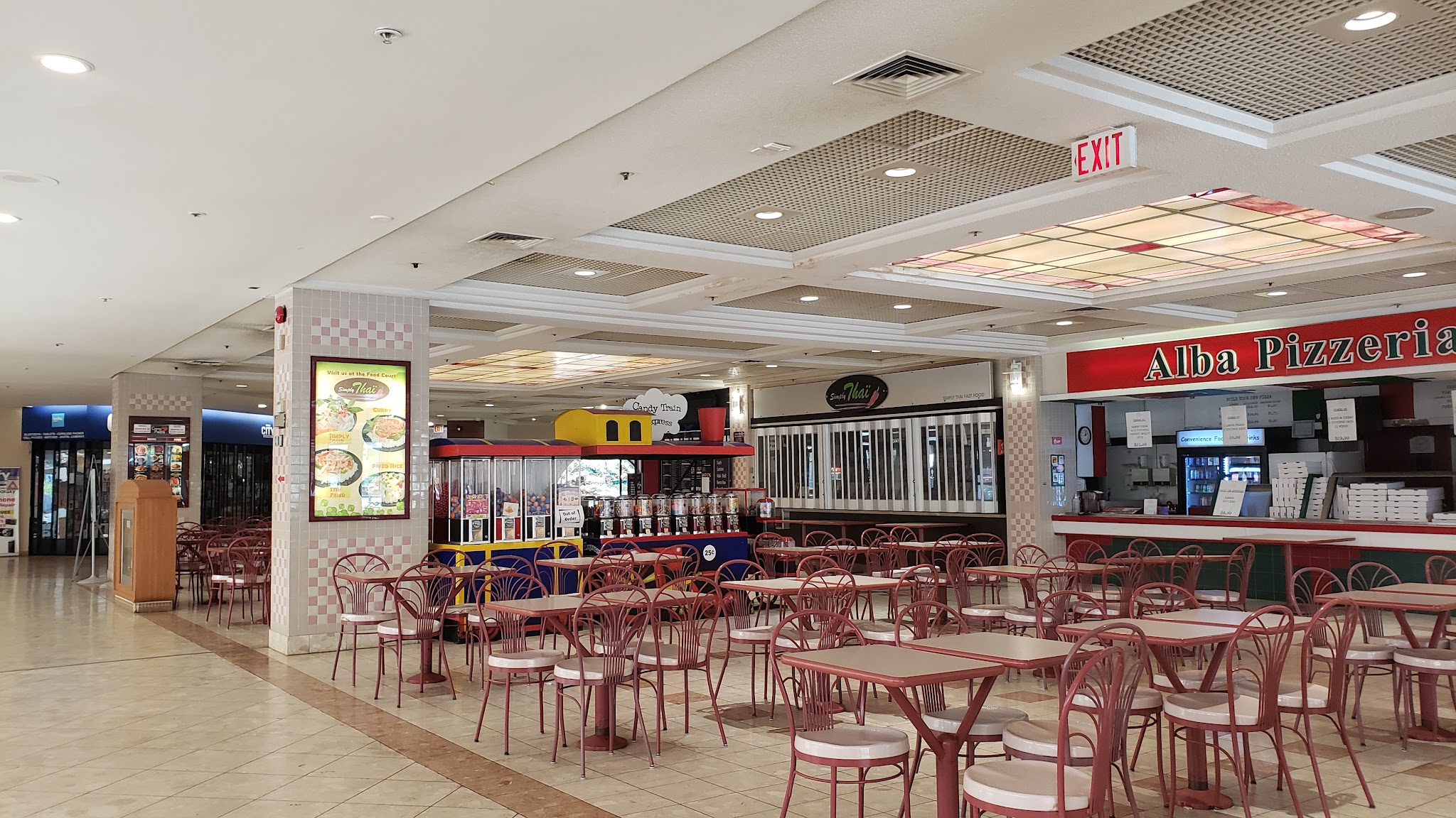 Alba Pizzeria and the Peterborough Square food court with red cafe chairs and a checkered tile floor